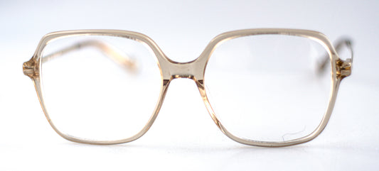 Retro inspirerad fyrkantig glasögonbåge i en transparent beige färg.